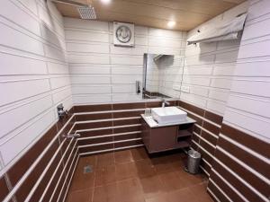 Koupelna v ubytování GS Cottages near Mall Road