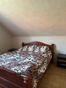 Postel nebo postele na pokoji v ubytování House Bubniv