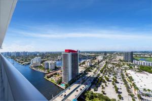an aerial view of a city with a river and buildings at Stylish 3BR Resort Condo with Beach Access, Two Infinity Pools and Private Balcony -NO RESORT & NO PARKING FEES, CHECK DETAILS in Hollywood