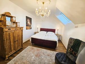 Postel nebo postele na pokoji v ubytování Lippingergut - Kaiserschmarrn Suite