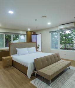 Ένα ή περισσότερα κρεβάτια σε δωμάτιο στο Vine and Canopy