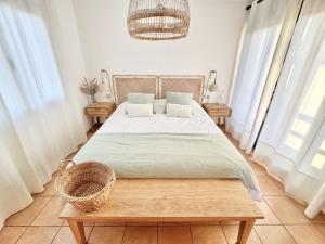 Ένα ή περισσότερα κρεβάτια σε δωμάτιο στο Villa Majanicho Outside con piscina +22 φωτογραφίες