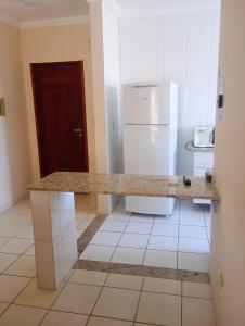 Kuchyň nebo kuchyňský kout v ubytování Apartamento em Mongaguá,beira mar