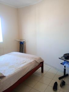 Postel nebo postele na pokoji v ubytování Apartamento em Mongaguá,beira mar + 3 fotografie