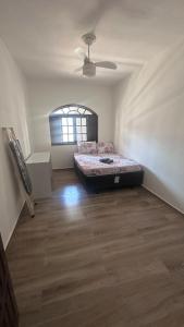 Postel nebo postele na pokoji v ubytování Casa em Rio das Ostras