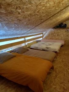 Postel nebo postele na pokoji v ubytování Le Nid Longère 8 pers