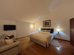 Ένα ή περισσότερα κρεβάτια σε δωμάτιο στο Bela Vigia +62 φωτογραφίες