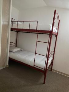 Postel nebo postele na pokoji v ubytování La Maisonnette du Soleil