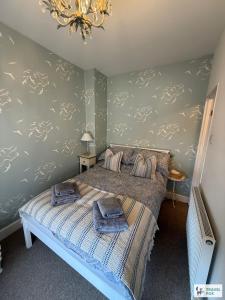 Postel nebo postele na pokoji v ubytování Seagull Cottage