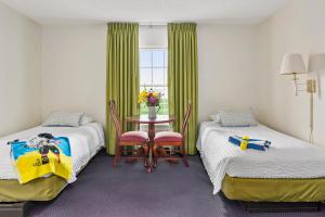 Voodi või voodid majutusasutuse Top Floor Standard Deluxe TBSD toas