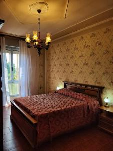 Postel nebo postele na pokoji v ubytování Dolce Sosta Casa Vacanza