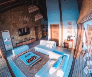 Postel nebo postele na pokoji v ubytování Villa Caraúbas + 30 fotografií