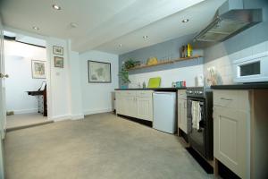 Kuchyň nebo kuchyňský kout v ubytování Pepper House Rooms