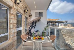 Μπαλκόνι ή βεράντα στο Mountain Top Views -201- נופי פסגות +1 φωτογραφίες