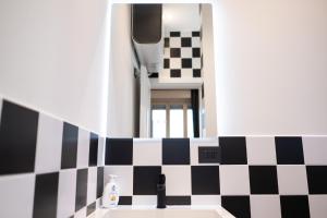 Koupelna v ubytování Lingotto Penthouse + 21 fotografií