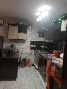 Una cocina o cocineta en شارع طيبة متفرع من جامعة الدول