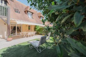 Zahrada ubytování Cottage Jaliel 80m2 au calme proche plage dans espace sécurisé