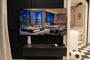 TV a/nebo společenská místnost v ubytování Lingotto Penthouse