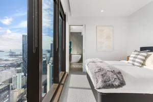 Postel nebo postele na pokoji v ubytování Luxury 2BR Apartment on Albert