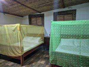 Ένα ή περισσότερα κρεβάτια σε δωμάτιο στο Tierra de Sol