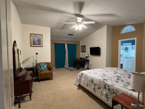 Ένα ή περισσότερα κρεβάτια σε δωμάτιο στο Hawaiian Coffee Hale