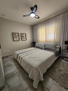 Voodi või voodid majutusasutuse 2bdr Hispaniola Hill Side Condo 4c3 toas +18 fotot