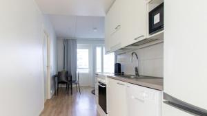 Η κουζίνα ή μικρή κουζίνα στο Central Apartment for 3