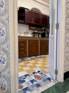 Kuchyň nebo kuchyňský kout v ubytování Medina Suite Apartment