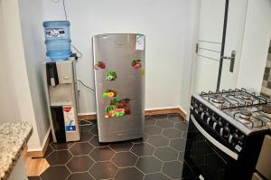 Η κουζίνα ή μικρή κουζίνα στο Juwell Haven