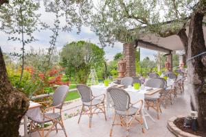 Сад в Olivi Hotel & Natural Spa