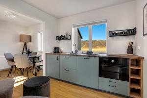 Η κουζίνα ή μικρή κουζίνα στο Kviholmi Premium Apartments