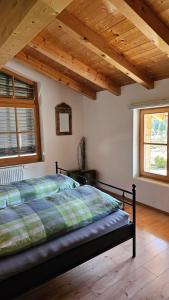 Ένα ή περισσότερα κρεβάτια σε δωμάτιο στο Ferienhaus Ulla