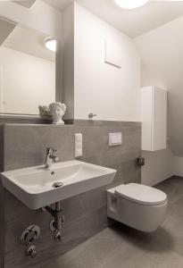 Koupelna v ubytování Ostseebad-Zinnowitz-Kernsanierte-Ferienwohnung-Glueck + 17 fotografií