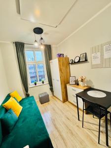 Kuchyň nebo kuchyňský kout v ubytování Przy Parku Róż