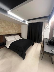 Giường trong phòng chung tại Il Moro Luxury Rooms