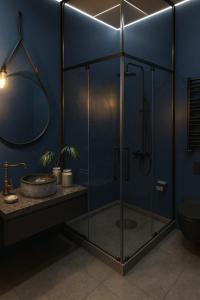 Ένα μπάνιο στο VanderLyn Blue Hotel