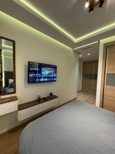 TV/trung tâm giải trí tại Luxury apartment Maarif near Stadium +10 ảnh
