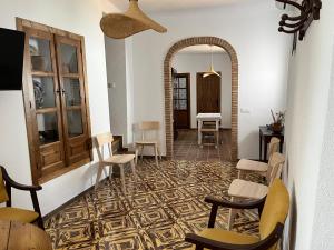 Χώρος καθιστικού στο Alojamientos El Carmen - Casa con Piscina Privada y Patio Andaluz