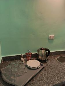 Příslušenství pro přípravu čaje a kávy v ubytování Villa Vivian + 83 fotografií