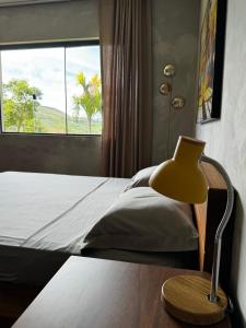 Ένα ή περισσότερα κρεβάτια σε δωμάτιο στο Villa Rivera