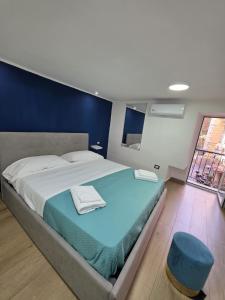 Postel nebo postele na pokoji v ubytování L'Approdo di Dante