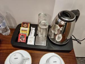 Příslušenství pro přípravu čaje a kávy v ubytování Astoria Cottage