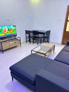 TV a/nebo společenská místnost v ubytování Castanheimmo GMBH0A