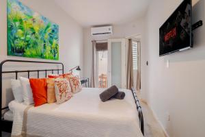 Voodi või voodid majutusasutuse Old San Juan Prime Blue Harbor toas