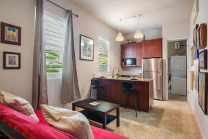 Televiisor ja/või meelelahutuskeskus majutusasutuses Old San Juan Prime Blue Harbor