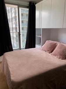 Voodi või voodid majutusasutuse Studio porto maravilha toas +25 fotot