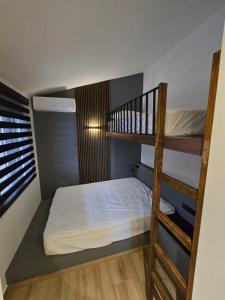 Ένα ή περισσότερα κρεβάτια σε δωμάτιο στο Casa Olymbra