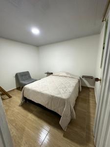 Ένα ή περισσότερα κρεβάτια σε δωμάτιο στο Casa hostal Disney