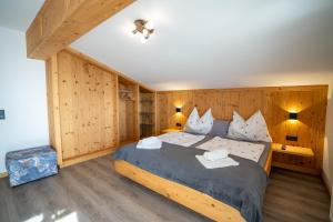 Postel nebo postele na pokoji v ubytování Haus Höllwart