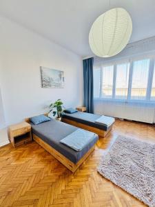 Ένα ή περισσότερα κρεβάτια σε δωμάτιο στο Symphonia self check in 24h +7 φωτογραφίες